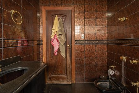 Casa à venda com 410m², 4 quartos e 3 vagasBanheiro Suíte