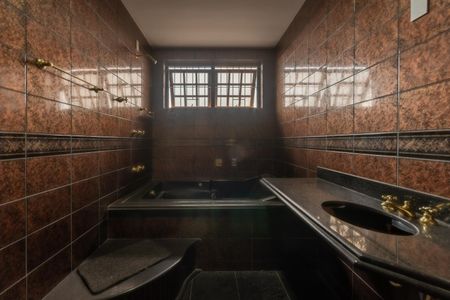 Casa à venda com 410m², 4 quartos e 3 vagasBanheiro Suíte