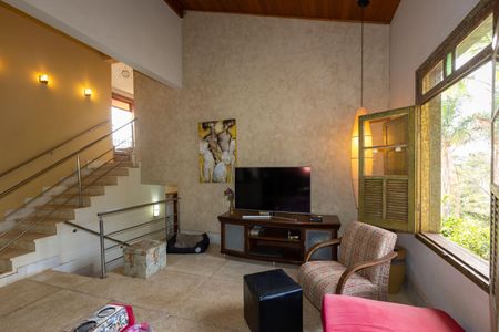 Casa de condomínio à venda com 500m², 4 quartos e 3 vagasSala de TV