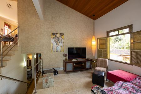 Casa de condomínio à venda com 500m², 4 quartos e 3 vagasSala de TV