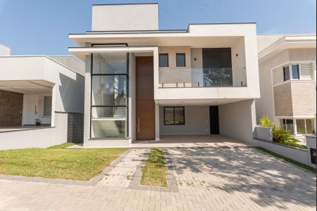 Casa de condomínio à venda com 330m², 4 quartos e 4 vagasFachada