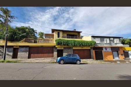 Casa à venda com 455m², 4 quartos e 4 vagas Casa à venda com 455m², 4 quartos e 4 vagasGaragem