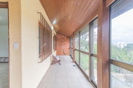 Varanda de casa à venda com 3 quartos, 144m² em Vila Nova, Porto Alegre