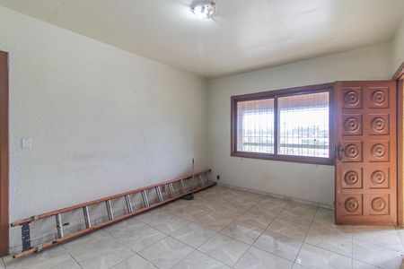 Sala de casa à venda com 3 quartos, 144m² em Vila Nova, Porto Alegre