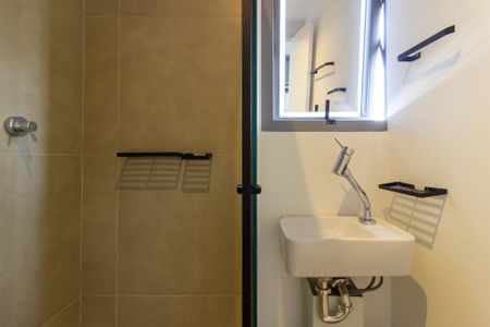 Banheiro de kitnet/studio à venda com 1 quarto, 21m² em Jardim Paulista, São Paulo