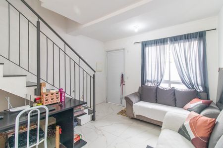 Sala de casa de condomínio para alugar com 2 quartos, 87m² em Vila Nova, Porto Alegre