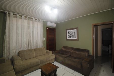 Casa à venda com 129m², 3 quartos e 3 vagasSala