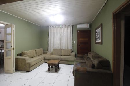 Sala de casa à venda com 3 quartos, 129m² em Rubem Berta, Porto Alegre