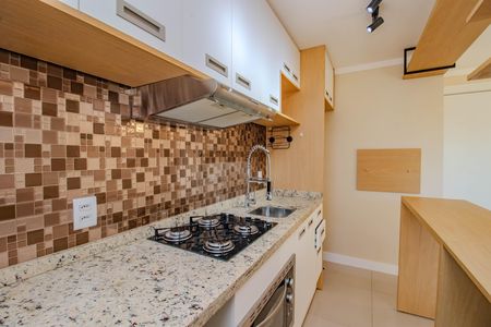 Apartamento à venda com 40m², 2 quartos e 1 vaga Apartamento à venda com 40m², 2 quartos e 1 vagaCozinha e Área de Serviço