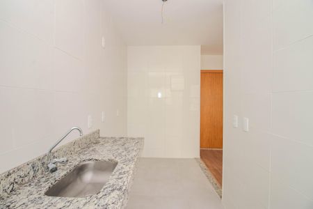 Apartamento à venda com 44m², 2 quartos e 1 vaga Apartamento à venda com 44m², 2 quartos e 1 vagaCozinha e Área de Serviço