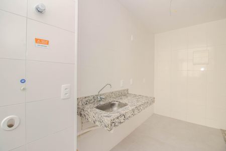 Apartamento à venda com 44m², 2 quartos e 1 vaga Apartamento à venda com 44m², 2 quartos e 1 vagaCozinha e Área de Serviço