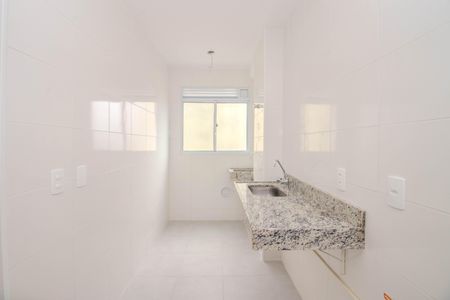 Apartamento à venda com 44m², 2 quartos e 1 vaga Apartamento à venda com 44m², 2 quartos e 1 vagaCozinha e Área de Serviço