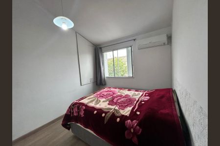 Quarto 1 de casa de condomínio à venda com 2 quartos, 97m² em Humaitá, Porto Alegre
