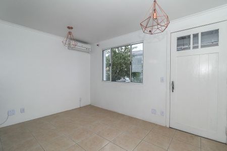 Sala de casa de condomínio à venda com 3 quartos, 91m² em Sarandi, Porto Alegre