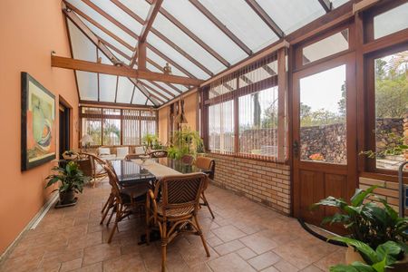 Casa à venda com 500m², 3 quartos e 4 vagas Casa à venda com 500m², 3 quartos e 4 vagasVaranda da Sala 1
