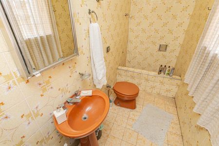 Casa à venda com 314m², 4 quartos e 3 vagasBanheiro 2