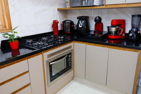 Casa à venda com 125m², 3 quartos e 3 vagas Casa à venda com 125m², 3 quartos e 3 vagasCozinha