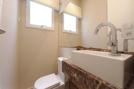 Casa de condomínio à venda com 258m², 4 quartos e 4 vagasLavabo