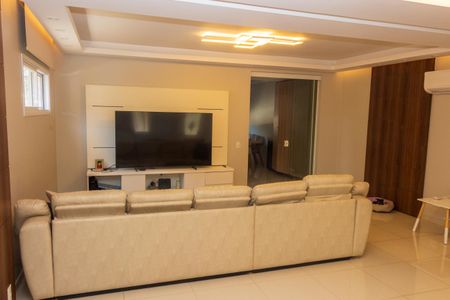 Casa de condomínio à venda com 258m², 4 quartos e 4 vagasSala