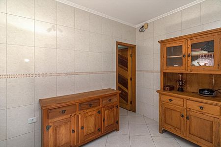 Casa à venda com 280m², 4 quartos e 2 vagas Casa à venda com 280m², 4 quartos e 2 vagasCozinha