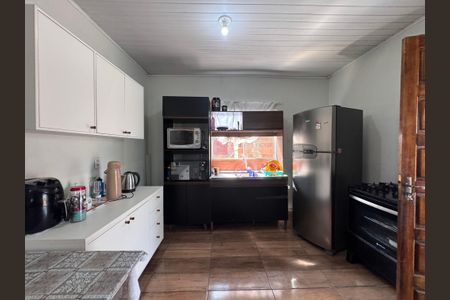Casa à venda com 90m², 2 quartos e 2 vagasSala/Cozinha