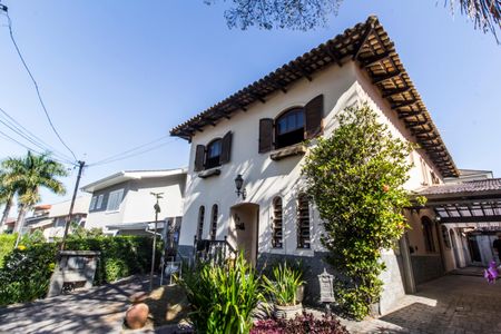 Casa de condomínio à venda com 385m², 4 quartos e 1 vagaFachada