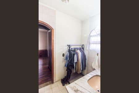 Casa de condomínio à venda com 385m², 4 quartos e 1 vagaBanheiro da Suíte 2