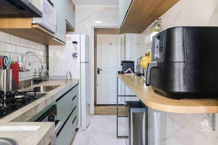 Apartamento à venda com 50m², 2 quartos e 1 vaga Apartamento à venda com 50m², 2 quartos e 1 vagaCozinha e Área de Serviço