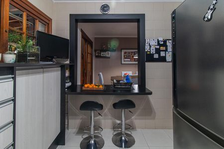 Casa de condomínio à venda com 126m², 3 quartos e 2 vagasCozinha e Área de Serviço