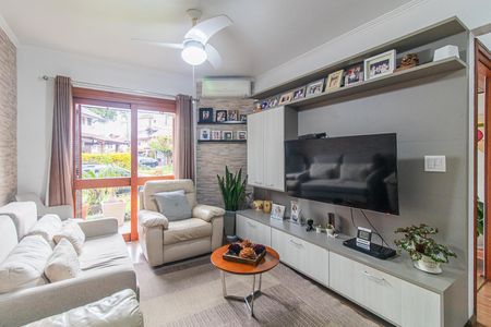 Sala de casa de condomínio à venda com 3 quartos, 126m² em Vila Nova, Porto Alegre