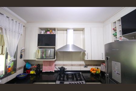 Casa à venda com 95m², 2 quartos e 2 vagas Casa à venda com 95m², 2 quartos e 2 vagasCozinha