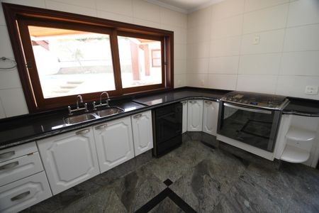 Casa de condomínio para alugar com 604m², 4 quartos e 6 vagasCozinha