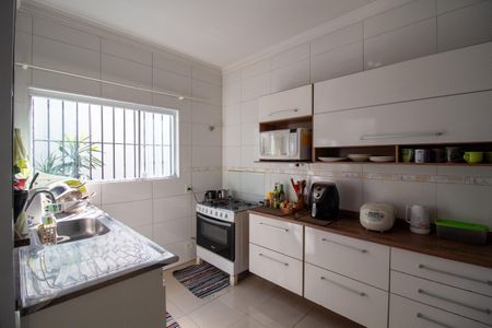 Casa à venda com 128m², 3 quartos e 2 vagas Casa à venda com 128m², 3 quartos e 2 vagasCozinha