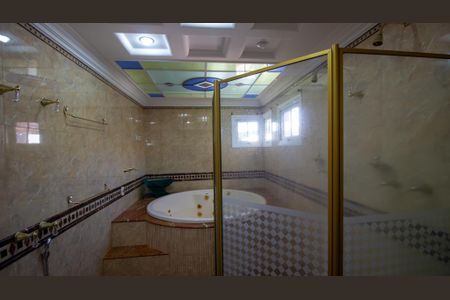 Casa de condomínio à venda com 600m², 4 quartos e 4 vagas Casa de condomínio à venda com 600m², 4 quartos e 4 vagasBanheiro da Suíte 1