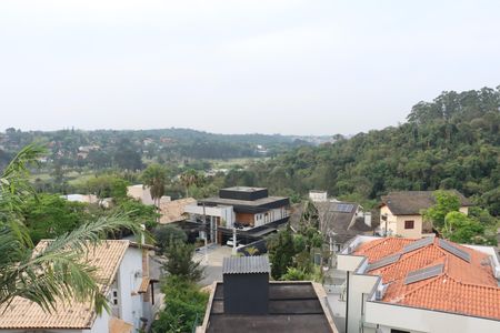 Casa de condomínio para alugar com 484m², 4 quartos e 3 vagasVista da Varanda da Suíte 1