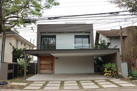 Casa de condomínio para alugar com 484m², 4 quartos e 3 vagasFachada