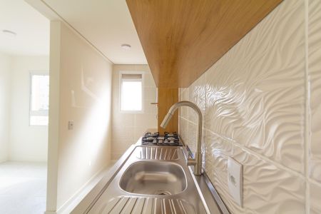 Apartamento à venda com 49m², 2 quartos e 1 vaga Apartamento à venda com 49m², 2 quartos e 1 vagaCozinha e Área de Serviço