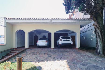 Casa à venda com 310m², 3 quartos e 3 vagas Casa à venda com 310m², 3 quartos e 3 vagasFachada