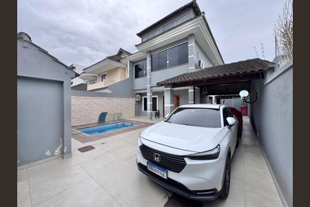 Casa de condomínio para alugar com 400m², 5 quartos e 2 vagasÁrea externa