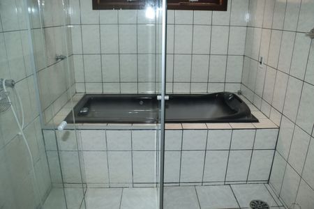 Casa de condomínio para alugar com 253m², 5 quartos e 2 vagasBanheiro Suíte