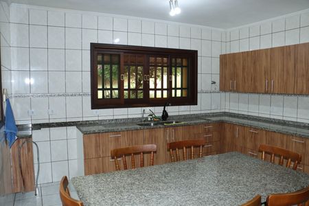 Casa de condomínio para alugar com 253m², 5 quartos e 2 vagasCozinha