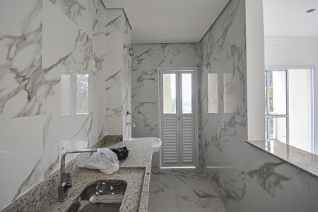 Apartamento à venda com 55m², 2 quartos e 1 vaga Apartamento à venda com 55m², 2 quartos e 1 vagaCozinha e Área de Serviço