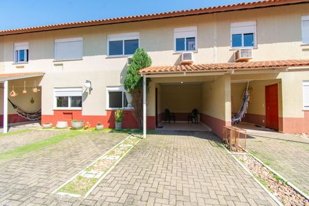 Casa de condomínio à venda com 100m², 3 quartos e 3 vagas Casa de condomínio à venda com 100m², 3 quartos e 3 vagasFachada