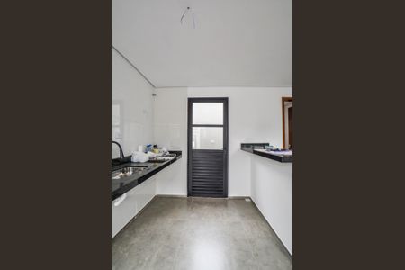 Casa à venda com 113m², 2 quartos e 2 vagas Casa à venda com 113m², 2 quartos e 2 vagasCozinha e Área de Serviço