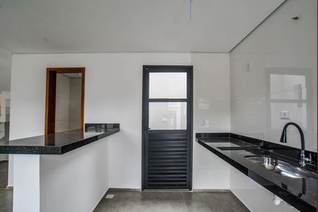 Casa à venda com 113m², 2 quartos e 2 vagas Casa à venda com 113m², 2 quartos e 2 vagasCozinha e Área de Serviço