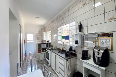 Casa à venda com 211m², 4 quartos e 4 vagas Casa à venda com 211m², 4 quartos e 4 vagasCozinha
