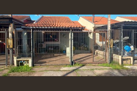 Casa à venda com 95m², 3 quartos e 2 vagas Casa à venda com 95m², 3 quartos e 2 vagasFachada