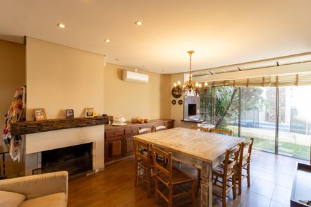 Sala de casa de condomínio à venda com 3 quartos, 175m² em Hípica, Porto Alegre