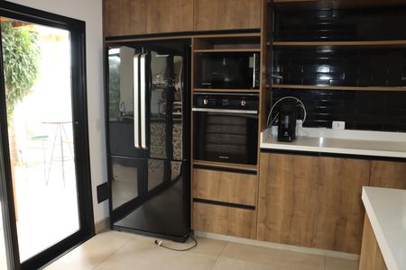 Casa de condomínio para alugar com 211m², 2 quartos e 2 vagasCozinha