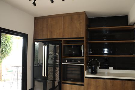 Casa de condomínio para alugar com 211m², 2 quartos e 2 vagasCozinha